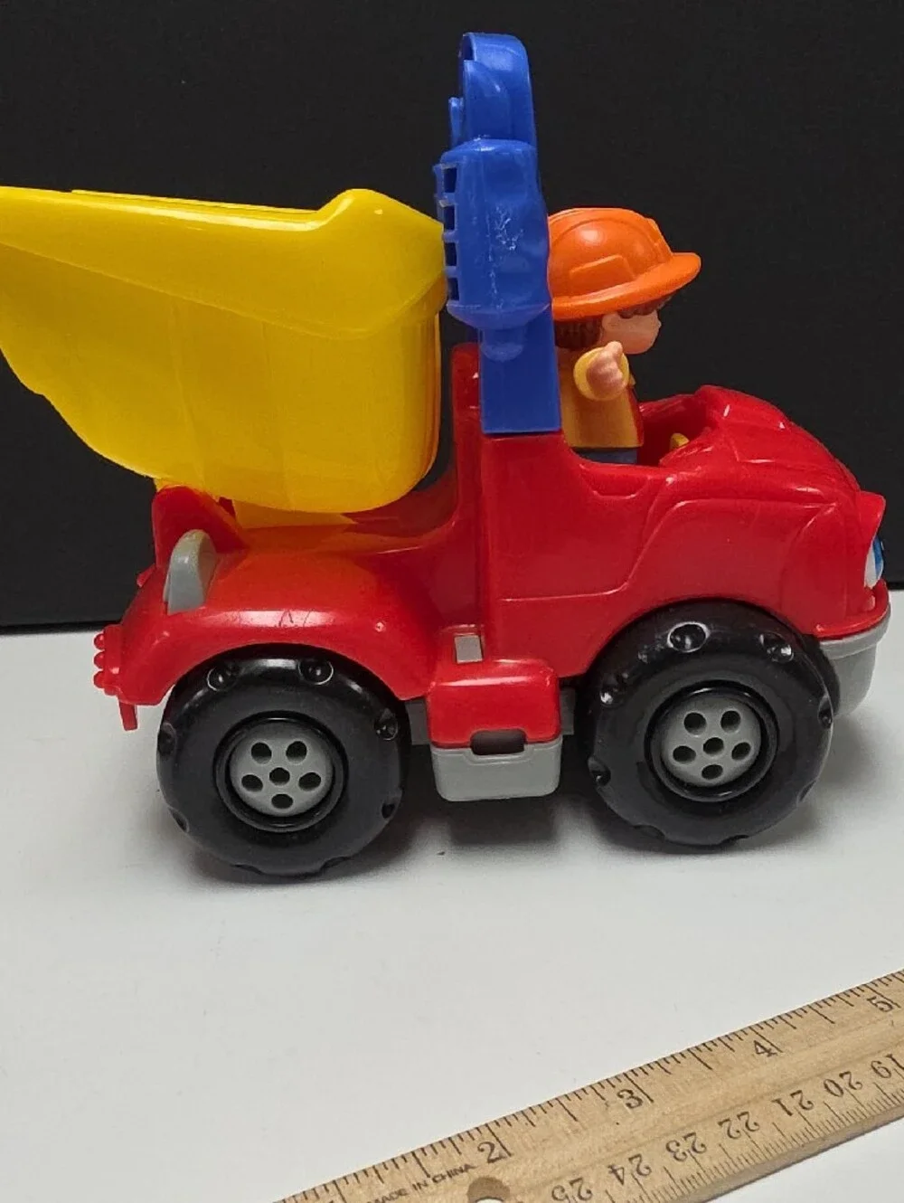 Fisher-Price Little People Red & Yellow Dump Truck with Figure And Accessory